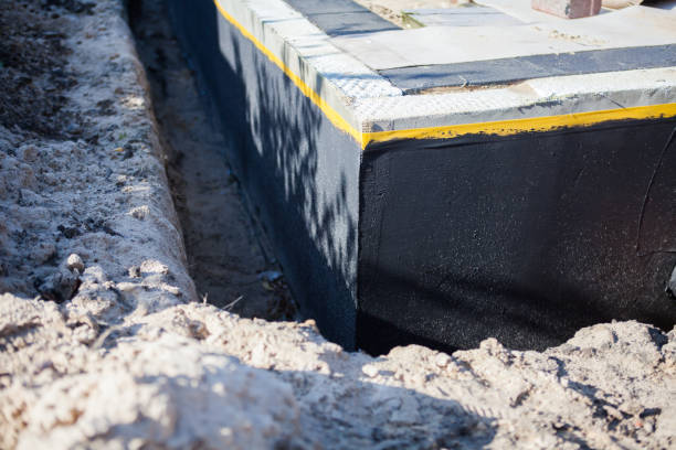 Professional Wet Basement Repair technician working in West Liberty, OH